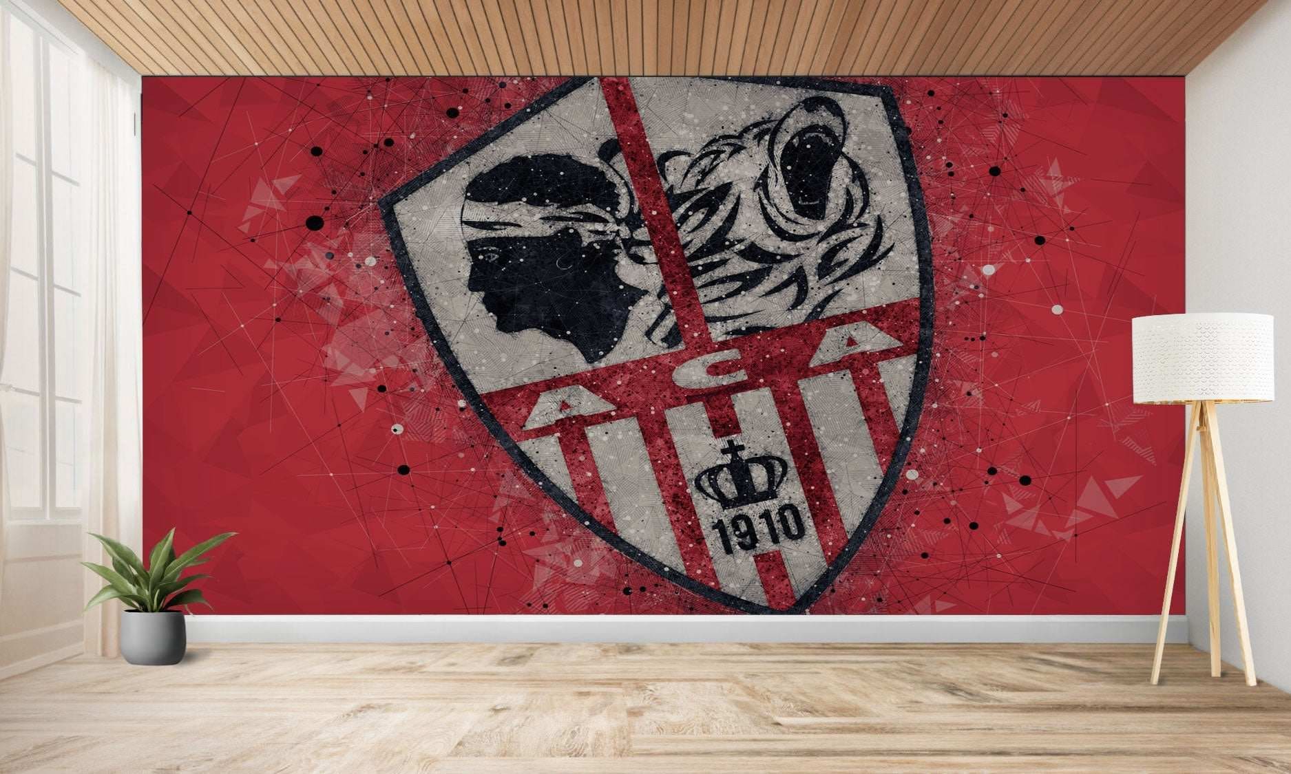 Murale rouge représentant l’écusson d’un club de football.