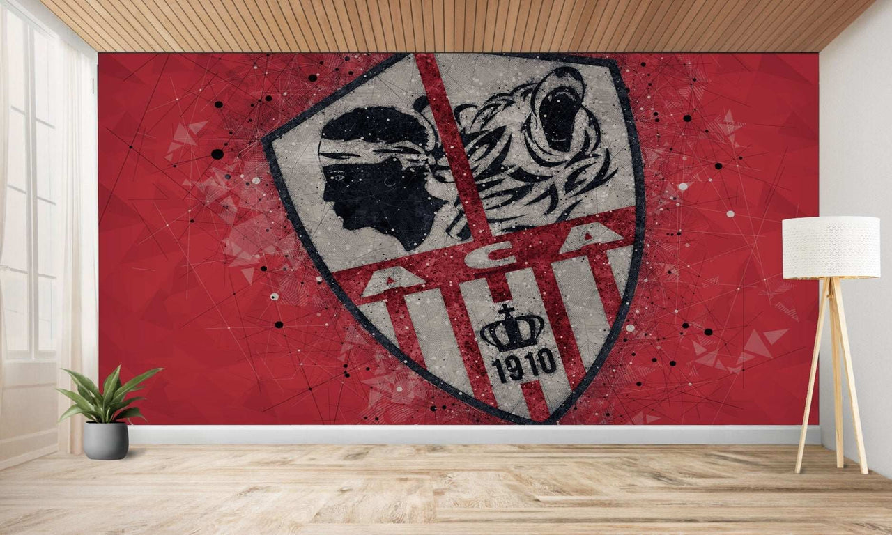 Murale rouge représentant l’écusson d’un club de football.