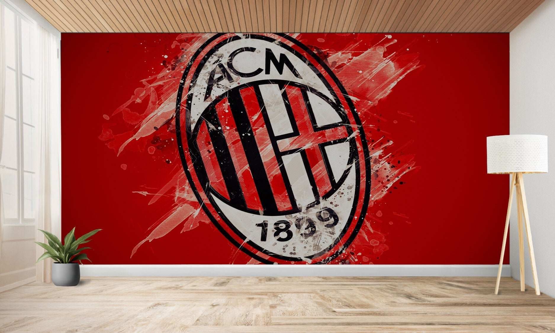Mur rouge avec le logo de l’AC Milan en blanc et noir.