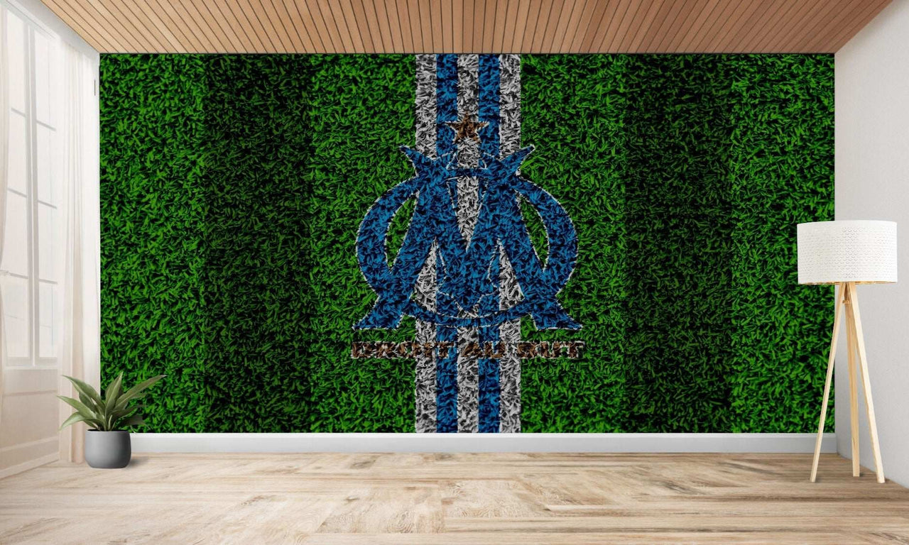 Peinture murale à texture d’herbe avec un logo d’équipe sportive.